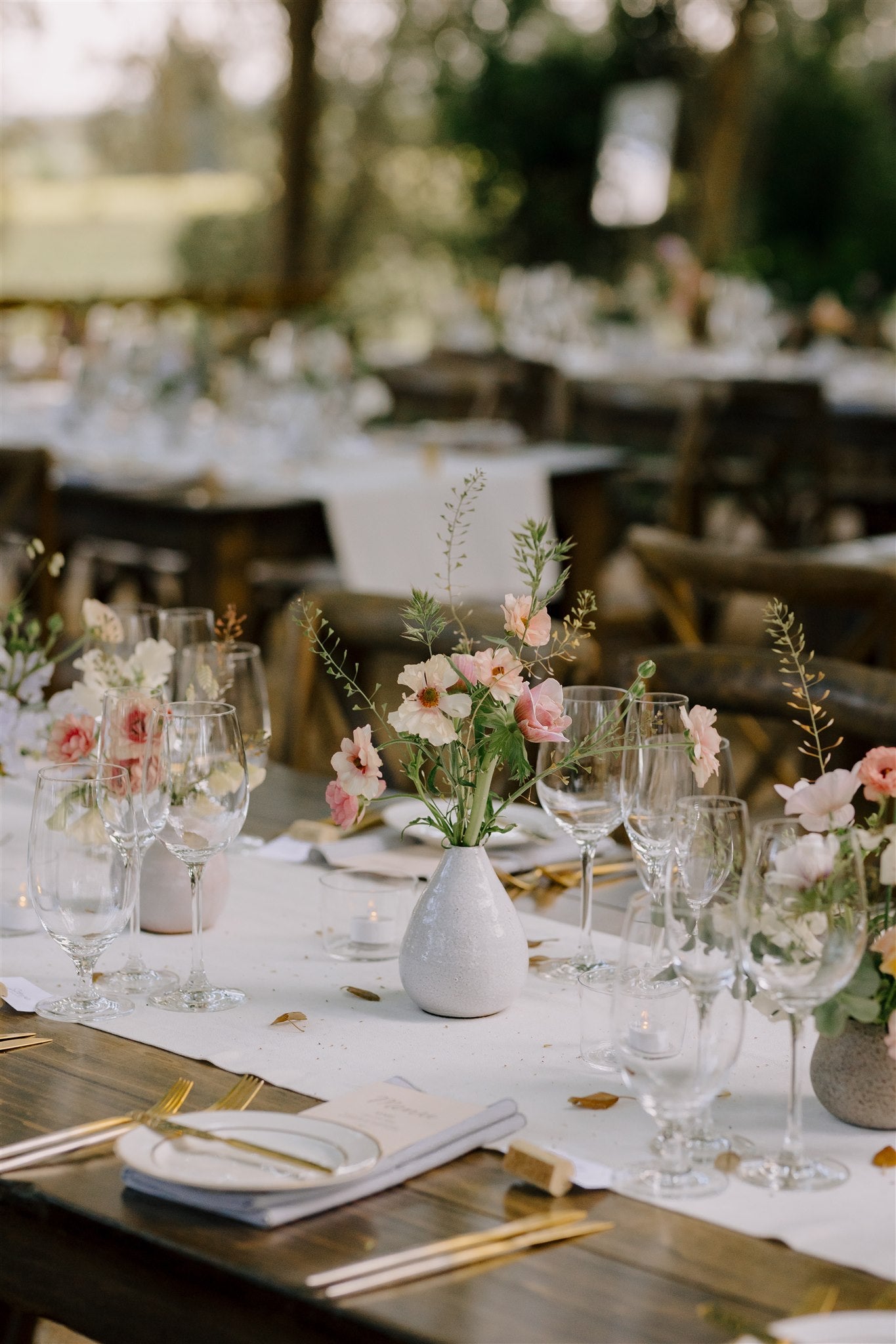 Medium bud vases on wedding table scape designed at Flower Porch using florals from Front Porch Farm in Healdsburg CA