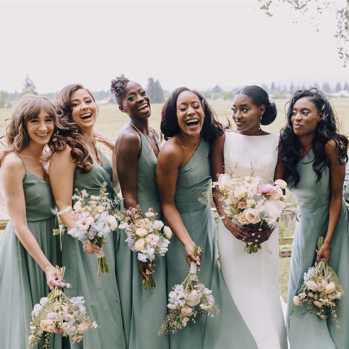 Bride and bridesmaids with floral bouquets designed at Flower Porch in Healdsburg CA